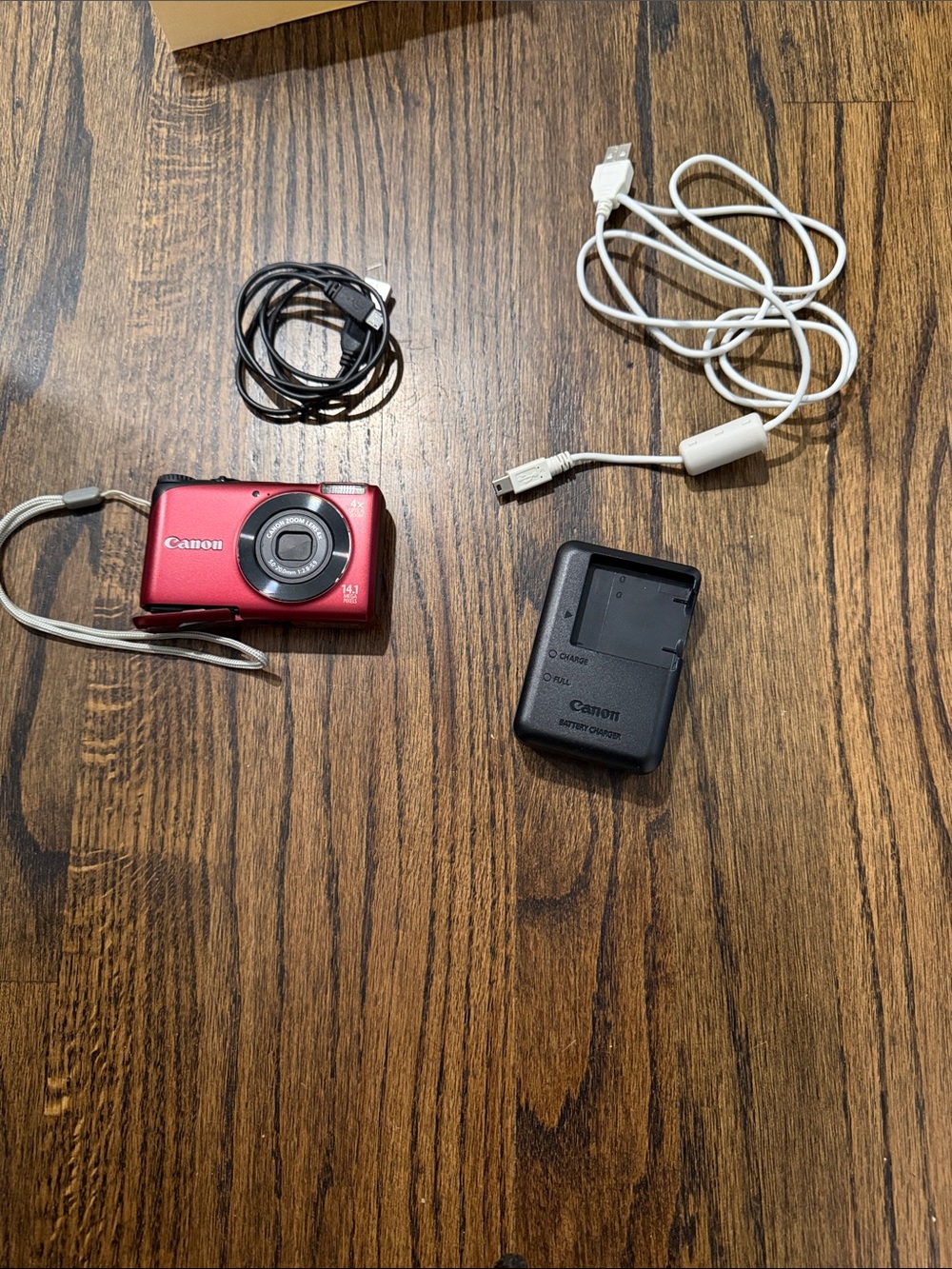 Canon PowerShot A2200 Digital Camera with Charger and Cables